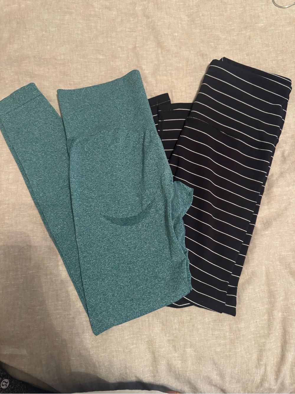 2 Pair of like new leggings- Women’s Teal Leggings & Black Striped Leggings - S